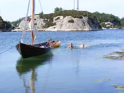 swimmers and faering in Norwegian fjord’